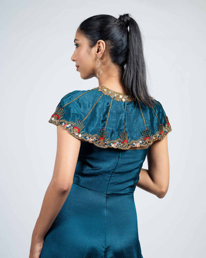 Pleated corset jumpsuit with shoulder cape
