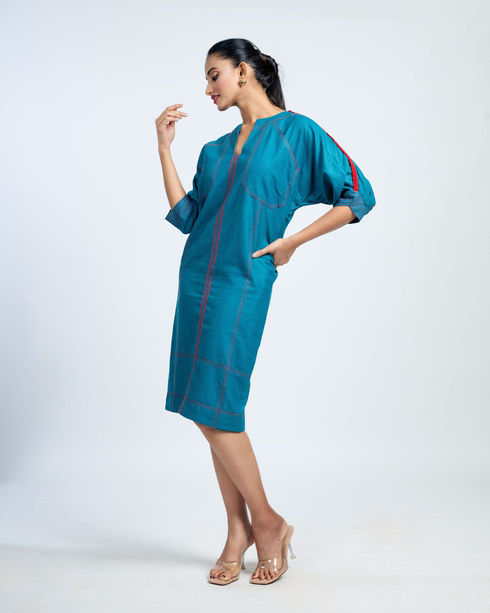 Teal Knee-Length Dress with Rust Stitch Detailing and V-Neckline Attriante Teal Knee-Length Dress with Rust Stitch Detailing and V-Neckline Attriante